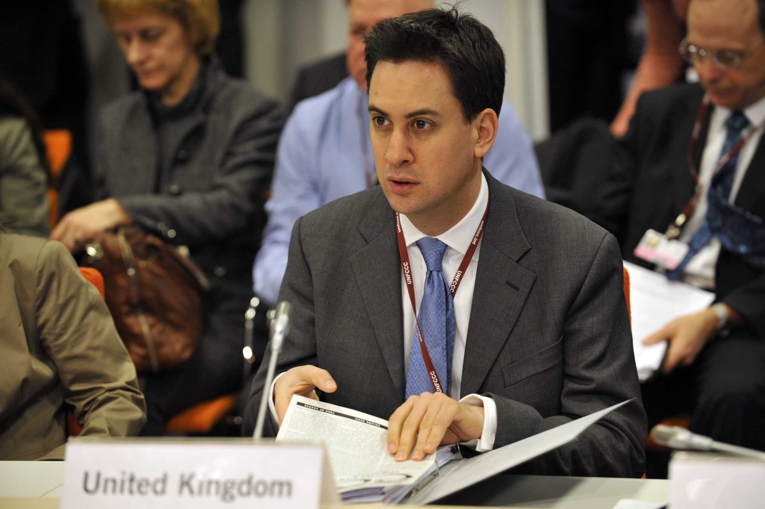 Miliband is under pressure to back the government's climate change plan