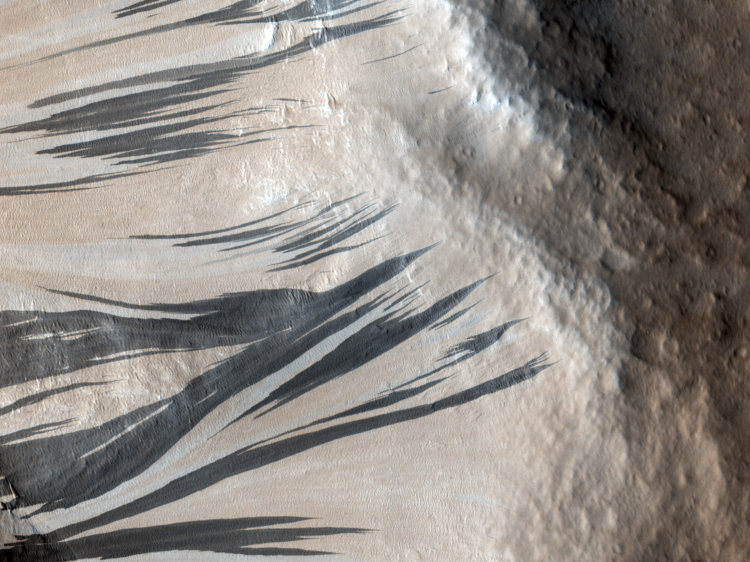 NASA: streaks of salt on Mars may mean flowing water, and new hopes of life