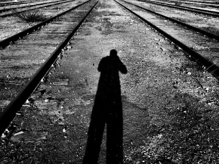 On a train that is delayed due to a suicide on the tracks, I contemplate time