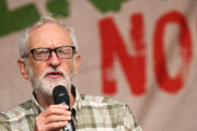 Jeremy Corbyn speaks into a microphone