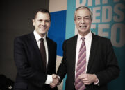 Robert Jenrick and Nigel Farage shake hands
